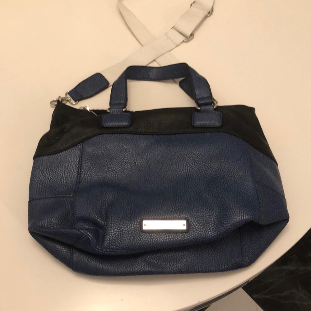 Leather or leather like crossbody bag